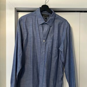 Blue dress shirt. Great with navy suit for monochromatic look